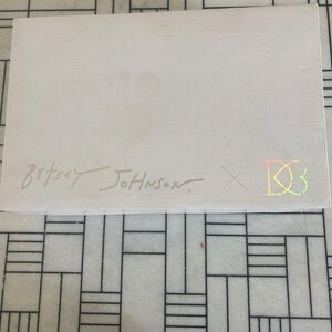 Silver and white Betsy Johnson sneakers